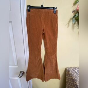 Young girl corduroy flared pants with pockets. Elastic waist.